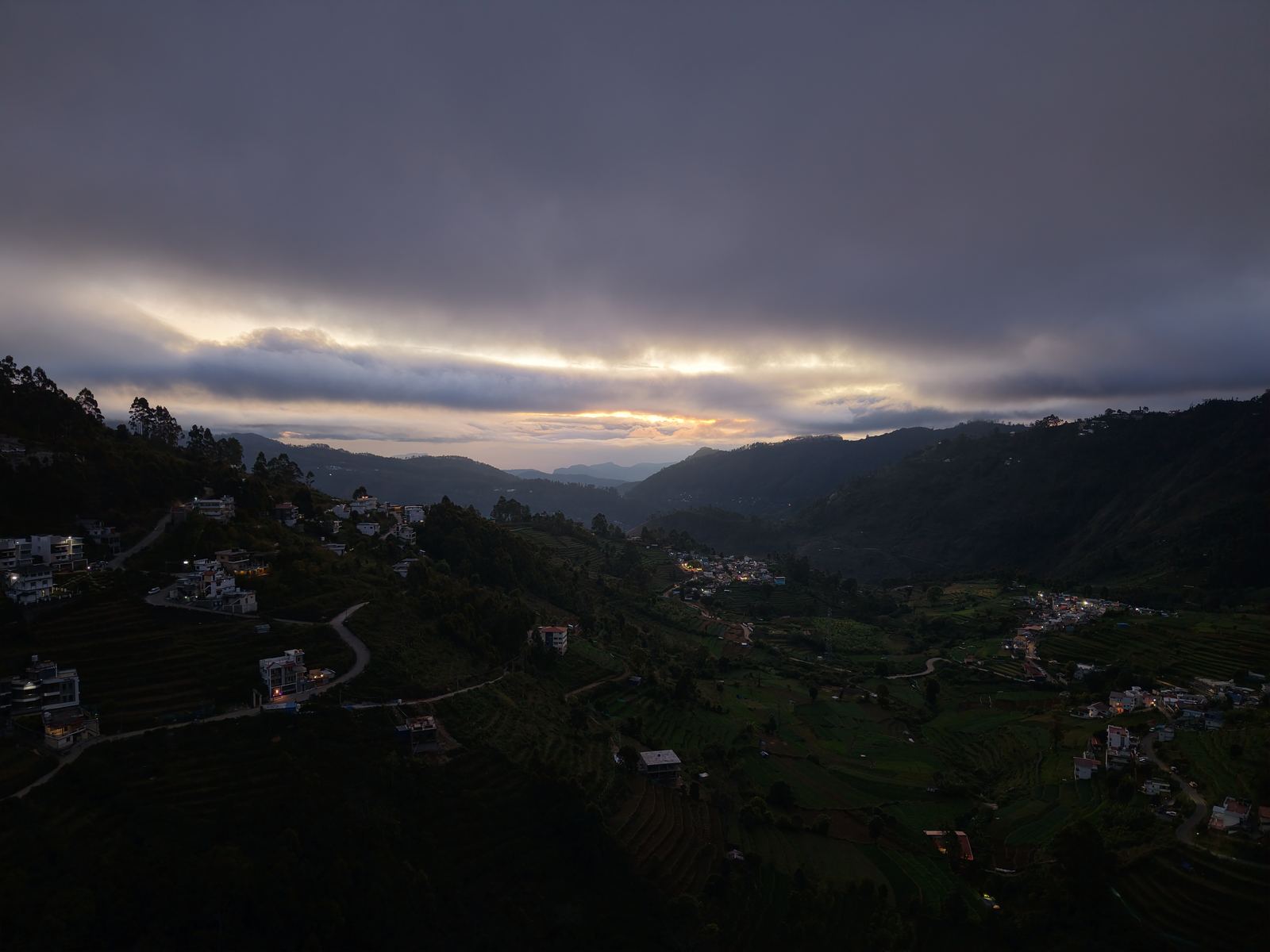 Sunrise over the terraced hills of the Kodaikanal valley